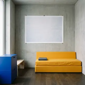 Daybed and bench by wall